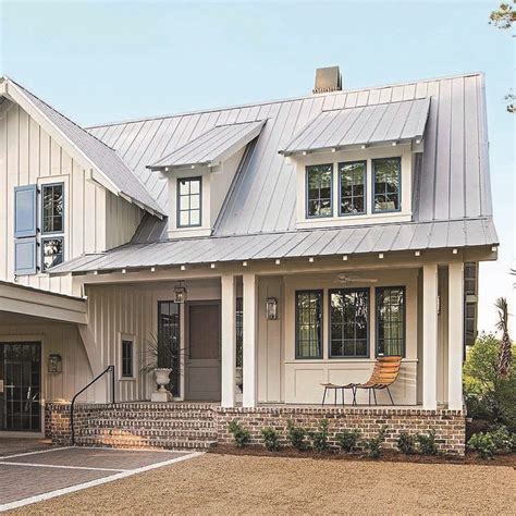 metal roof on brick ranch house|modern farmhouse with metal roof.